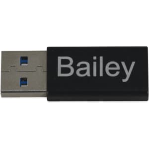A USB C adapter in black with a silver branding logo, featuring a blue USB connector.