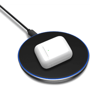 A black Qi wireless charger with a white charging case placed on top, featuring a blue light ring.
