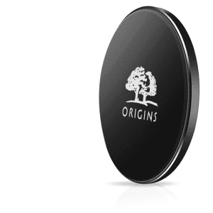 A black QI wireless charger with a circular design and a logo featuring a tree.