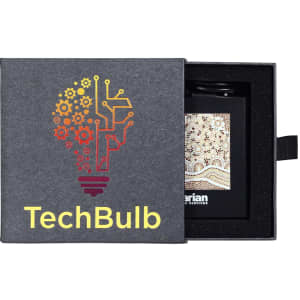 A black box with a logo featuring a light bulb design in orange and yellow, containing a decorative item inside.