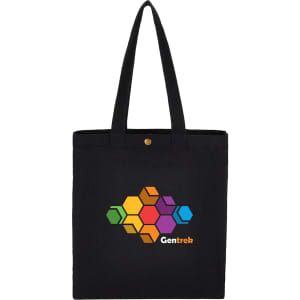 A black recycled cotton tote bag featuring a colourful geometric design and a logo, with long handles and a snap closure.