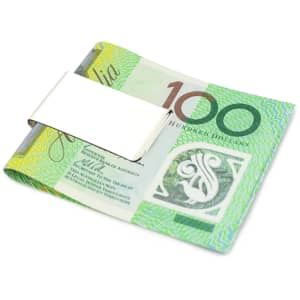 A metal money clip holding Australian banknotes, featuring a sleek silver design against a green currency backdrop.