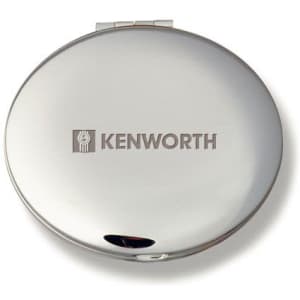 A silver compact mirror with a shiny finish and a logo on the front.