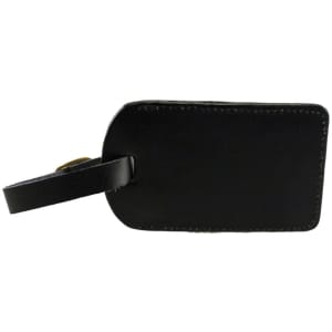 A black luggage tag with a leather finish and a strap for attachment. It has a minimalistic design.