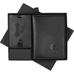 A black leather travel gift set featuring a wallet and luggage tag, presented in an elegant box with branding.