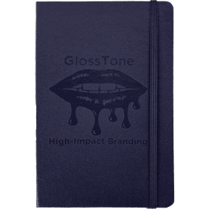 A navy blue journal with a textured cover and an elastic closure. It features a branding logo on the front.