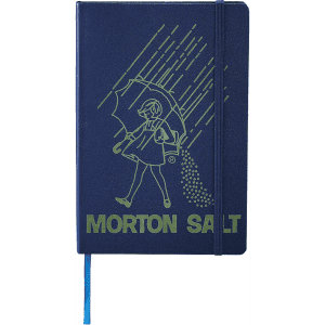 A navy notebook with an elastic band featuring a logo and an illustration of a girl with an umbrella.
