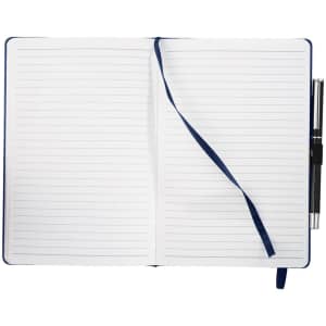 A navy blue bound journal with lined pages, a ribbon bookmark, and a pen attached.