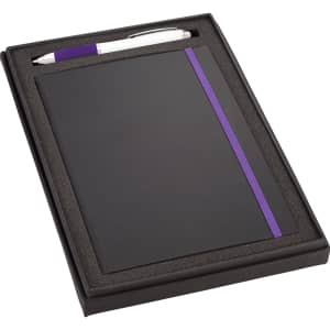 A black gift set featuring a JB1001 journal with a purple elastic band and a silver Nash pen, presented in a neat box.
