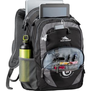 A black and grey backpack featuring multiple compartments, pockets, a drink bottle holder, and a logo.