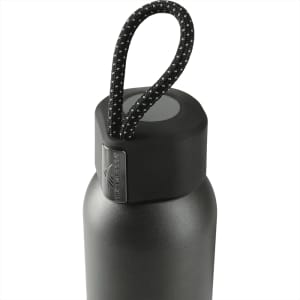 A drink bottle in matte black with a lid featuring a textured grip and a black rope handle. It has a logo.