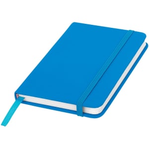 A blue pocket notebook with an elastic band and ribbon bookmark. It has a smooth cover and is compact in size.