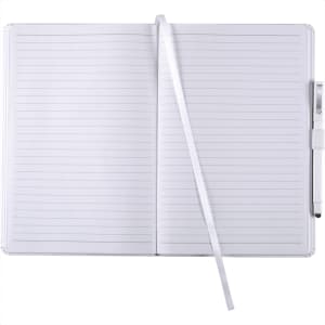 A large hard-bound journal in white with lined pages, a ribbon placeholder, and a pen holder.