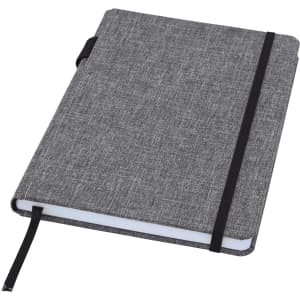 A grey A5 notebook with a textured cover, elastic band closure, and bookmark ribbon. Features a branding logo.