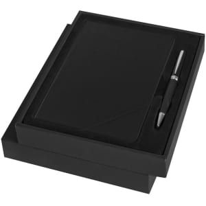 A black notebook and pen gift set presented in a sleek black box. The set features a stylish design and includes a logo.