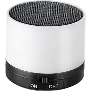 A cylindrical Bluetooth speaker in white and black with an on/off switch. It features a mesh grille on top and a logo.