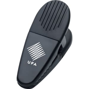 A black magnetic memo holder/clip with a textured grip and a logo. Suitable for office use.
