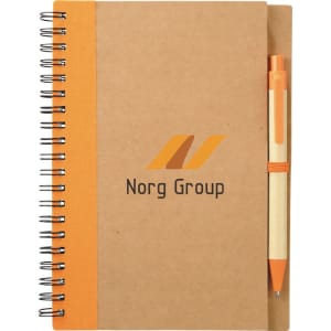 A brown spiral notebook with an orange pen attached, featuring a logo on the front cover.