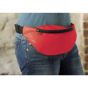 A red fanny pack with a zippered pocket, worn around the waist over denim jeans. It features a branding logo.