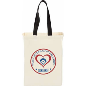 A natural cotton grocery tote in cream with black handles and a logo featuring a heart and text.
