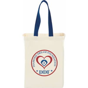 A natural cotton grocery tote in cream with blue handles and a logo featuring a heart and diamond design.