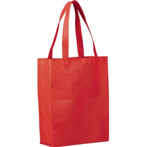 A red non-woven tote bag with two shoulder straps and a large rectangular body. It features a logo.