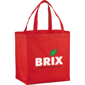 A red non-woven shopper tote bag with two handles and a logo on the front.