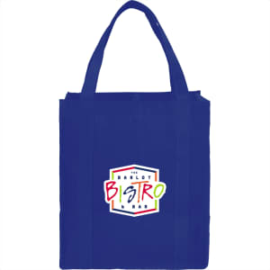 A blue non-woven grocery tote with sturdy handles and a logo on the front.