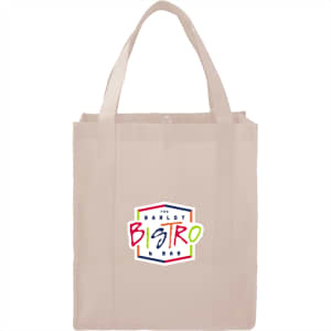 A beige non-woven grocery tote bag with two handles and a logo on the front.