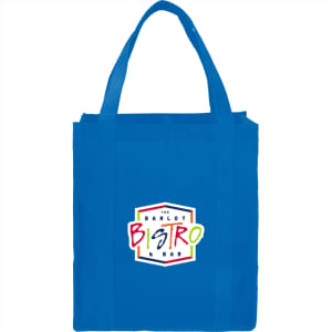 A blue reusable grocery tote bag with sturdy handles and a logo on the front.