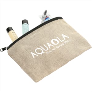 A beige recycled cotton twill pouch with a zip, containing toiletries and a toothbrush, featuring a logo.