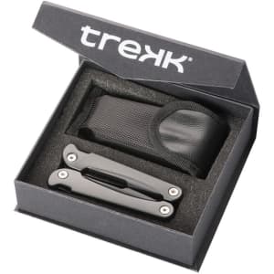 A multi-tool in a black box with a protective foam insert and a black pouch, featuring a logo on the box.