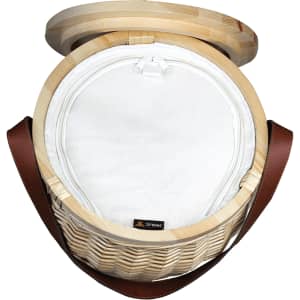 Wicker cooler basket with a wooden lid, featuring a white interior and brown leather strap.