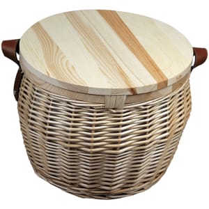 A wicker cooler basket with a wooden lid and leather handles, featuring a natural colour scheme.