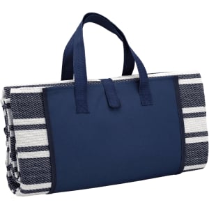 A folded picnic rug featuring a navy blue and white striped design, complete with sturdy handles.