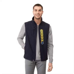 A navy softshell vest for men with a full zipper and a logo, worn over a grey long-sleeve shirt.