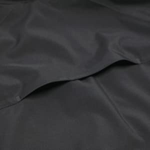 A black Oracle Softshell Jacket made from smooth fabric, featuring pockets and a subtle logo.