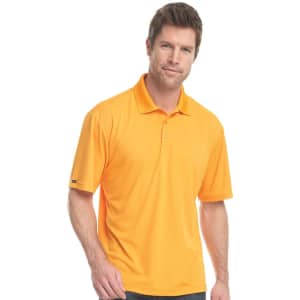 A man wearing a bright yellow short sleeve polo shirt with a logo on the sleeve.