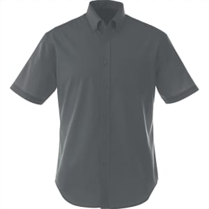 A short sleeve men's button-up shirt in dark green, featuring a collar and a chest pocket. It has a logo.
