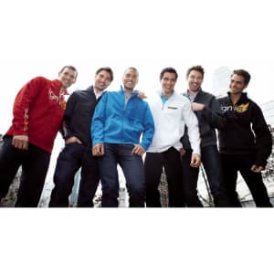 A group of men wearing various coloured jackets, including red, blue, white, and black. Each jacket features a logo.