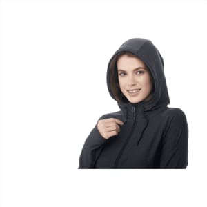 A woman in a zip-up, grey hoodie jacket with a hood, featuring a logo on the chest area.