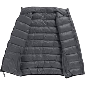 A grey women's insulated vest with an open front, featuring quilted panels and pockets. It has a logo on the interior.