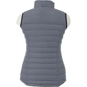 A grey women's light down vest with a high collar and stitched panels, featuring a logo on the back.