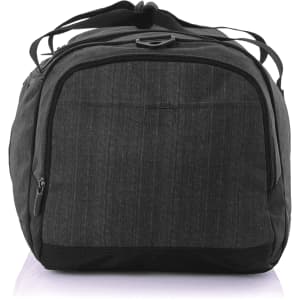 A grey duffle bag with a zippered main compartment and dual carrying straps, featuring branding on the exterior.