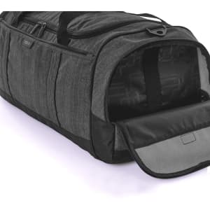 A grey duffle bag with multiple compartments and an interior pocket, featuring a zippered opening and a logo.