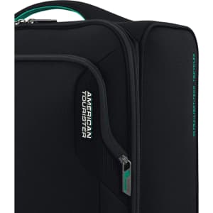 A black travel underseater bag with a zipper and a branding logo. Features a teal accent on the handle.