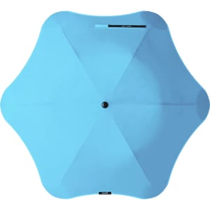 A blue BLUNT Metro Umbrella with a unique star shape and a central button mechanism. It features branding on the canopy.