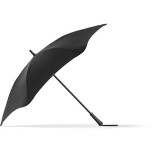 A black BLUNT Classic Umbrella features a sleek design with a curved canopy and a sturdy frame.