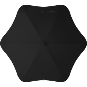 A black BLUNT Classic Umbrella with a unique star shape and a central button for opening and closing.