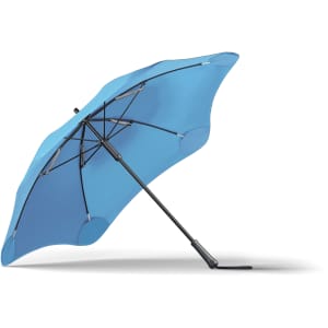 A blue BLUNT Classic Umbrella with a sturdy black frame and a unique shape, featuring a logo.